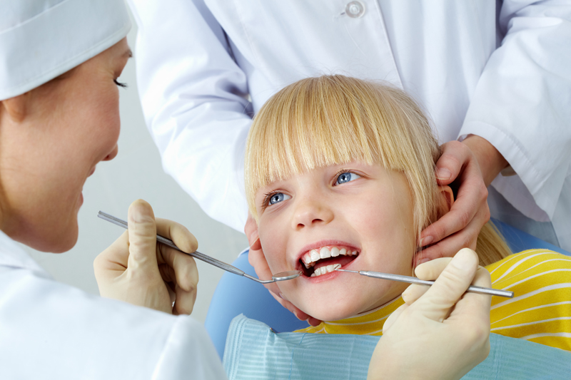 Tips to Help Your Children Overcome A Fear of the Dentist child at dentist small - Tips to Help Your Children Overcome A Fear of the Dentist
